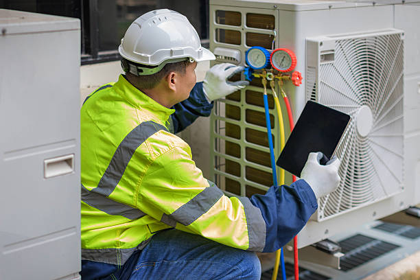 Professional Hvac technician working in Dracut, MA